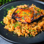 Cypriot pourgouri pilafi served with honey glazed halloumi and fresh parsley.