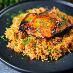 Cypriot pourgouri pilafi served with honey glazed halloumi and fresh parsley.