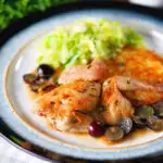 Roast spatchcock quail with Marsala and black grape sauce, buttered cabbage and potato rosti.