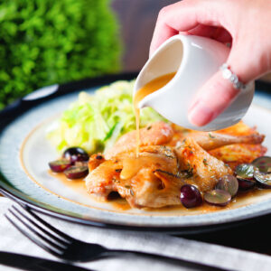 Roast Spatchcock Quail with Marsala Wine sauce black grapes, buttered cabbage and potato rosti.