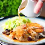 Marsala wine sauce being poured over a roasted spatchcock quail.