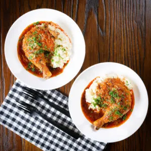 Poulet au vinaigre, chicken legs in vinegar served with celeriac mash.