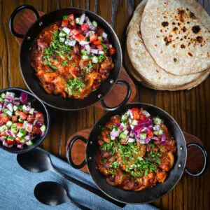 Punjabi rajma masala (kidney bean curry) served with kachumber salad and home made chapatis.