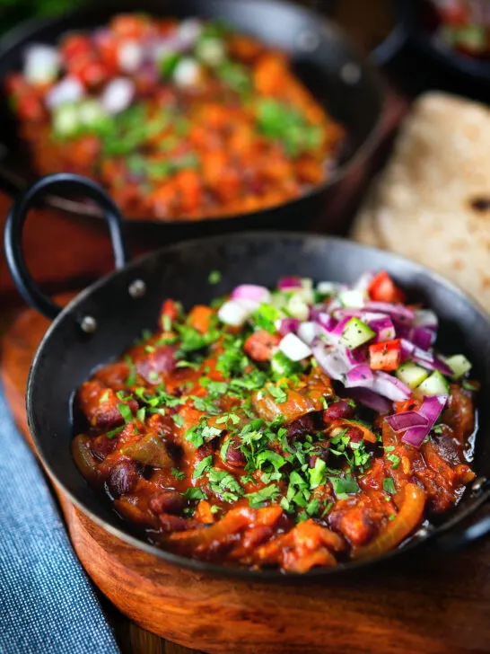 Rajma masala (kidney bean curry) served with kachumber salad and homemade chapatis.