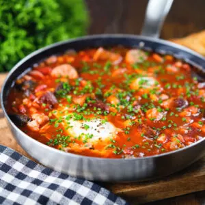 "Full English" sausage and baked bean breakfast casserole served with toast soldiers.