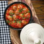 Overhead spicy Moroccan-influenced lamb (kefta) meatball tagine.