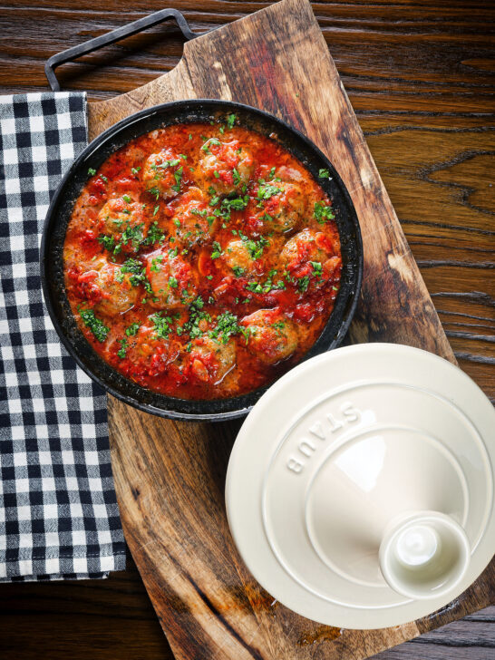 Overhead spicy Moroccan-influenced lamb (kefta) meatball tagine.