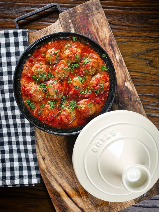 Overhead spicy Moroccan-influenced lamb (kefta) meatball tagine.