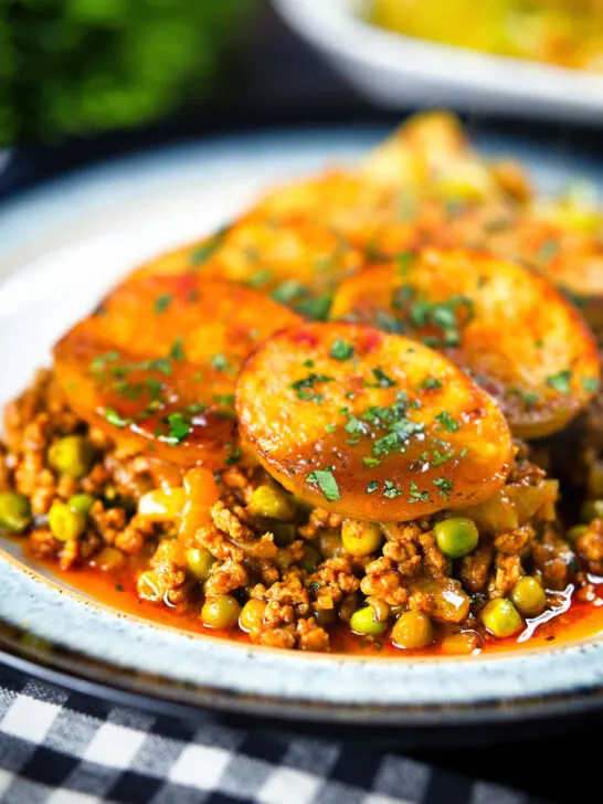 Minced lamb (keema) and potato hotpot with Indian-influenced flavours served with cabbage poriyal.