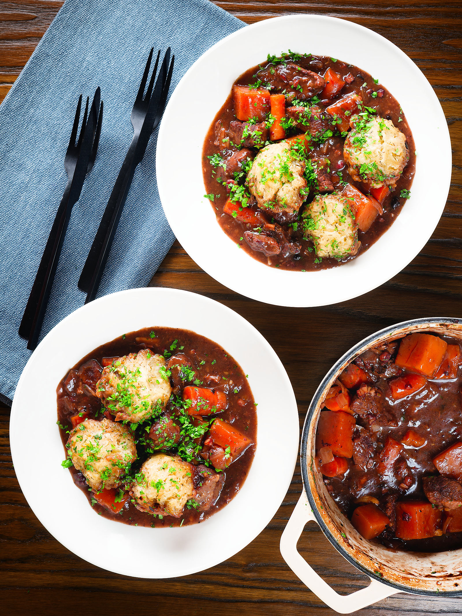Overhead rich red wine and port venison stew or casserole with suet dumplings.