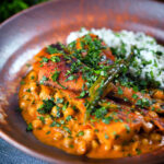 Vegetarian chickpea and parsnip curry served with coriander rice.