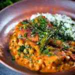 Vegetarian chickpea and parsnip curry served with coriander rice.