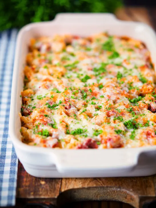 Corned beef and tomato macaroni pasta bake with a cheesy topping.
