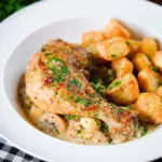 Somerset chicken legs in a creamy cider and cheddar sauce served with mini roast potatoes.
