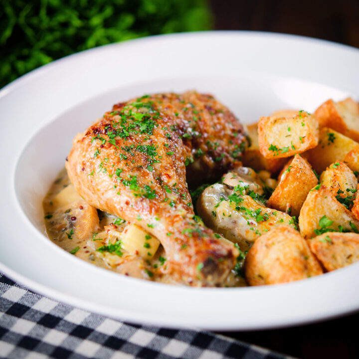 Somerset chicken in a cider, cheddar cheese and cream sauce served with mini roast potatoes.