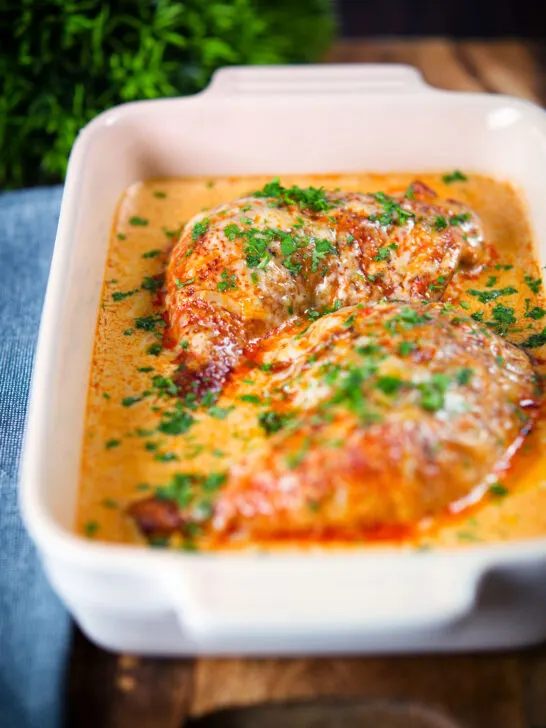 Dijon chicken leg or poulet Gaston Gerard in a gratin dish.