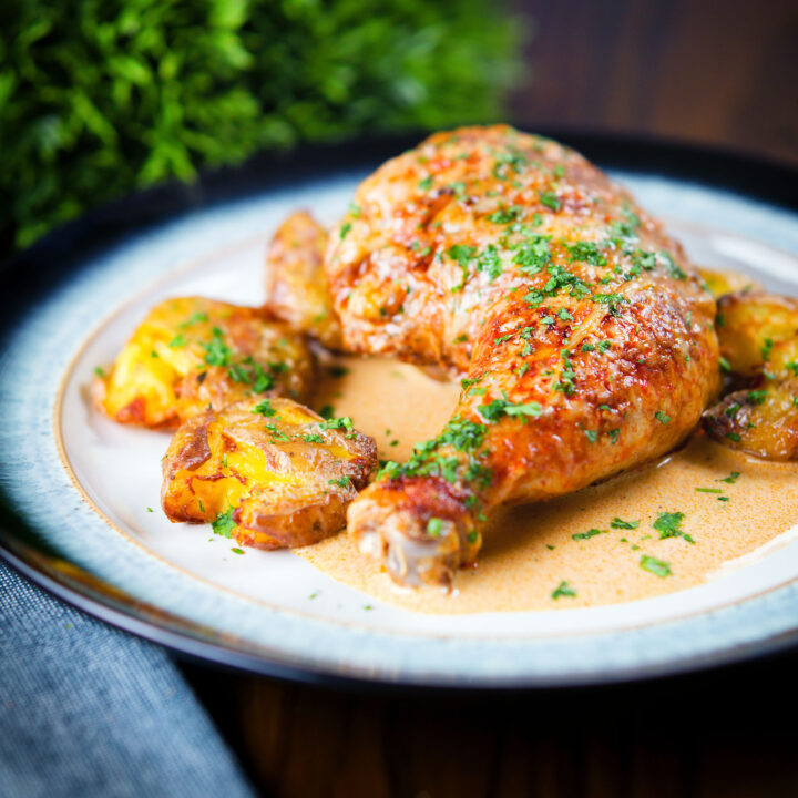 Dijon chicken or poulet Gaston Gerard served with roasted crushed new potatoes.