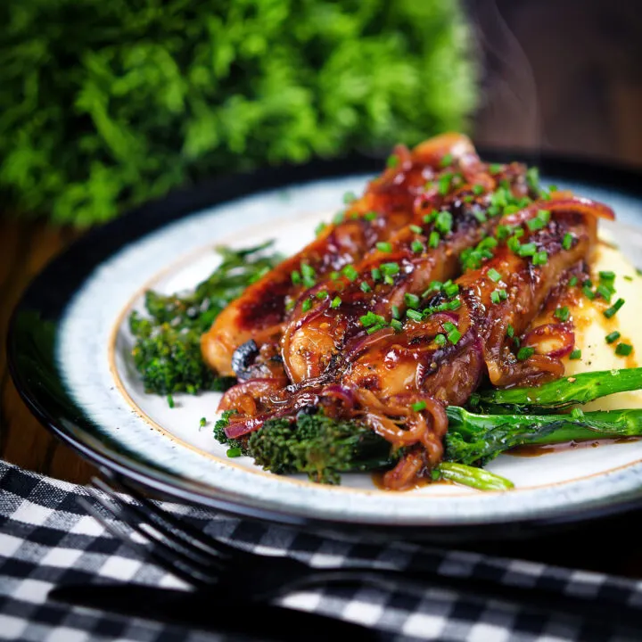 Cider, honey and mustard glazed sausages with mash and roasted tenderstem broccoli.