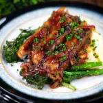 Cider, honey and mustard glazed sausages with mashed potato and tenderstem broccoli.
