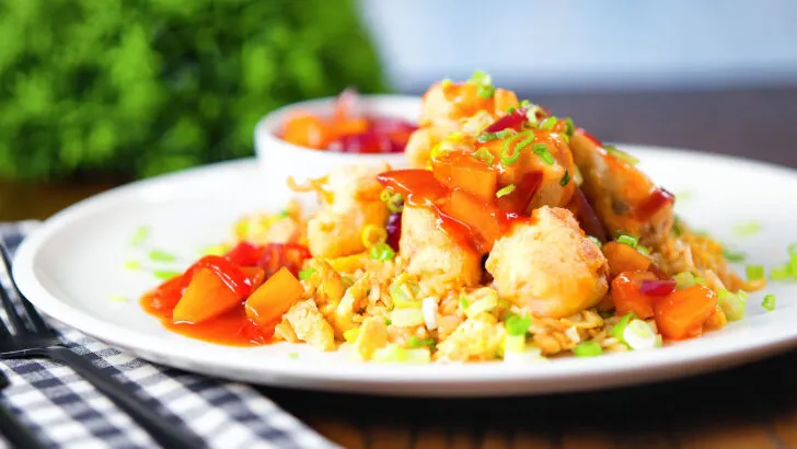 Crispy Chinese sweet and sour pork balls served with white rice. Updated
