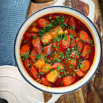 Hungarian paprikas krumpli (paprika potatoes) in cooking pan.