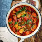 Hungarian paprikas krumpli (paprika potatoes) in cooking pan.