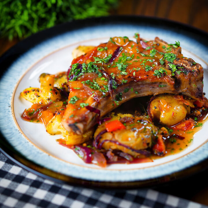Baked mango chutney pork chops with Indian influenced roasted Bombay potatoes.