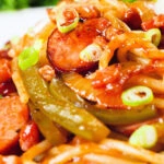Close-up Japanese spaghetti napolitan a tomato ketchup pasta with sausage and bacon.
