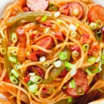 Overhead close-up Japanese spaghetti napolitan a tomato ketchup pasta with sausage and bacon.
