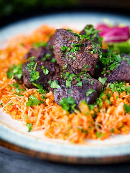 Afelia or Cypriot pork braised in red wine and coriander seeds with pourgouri.