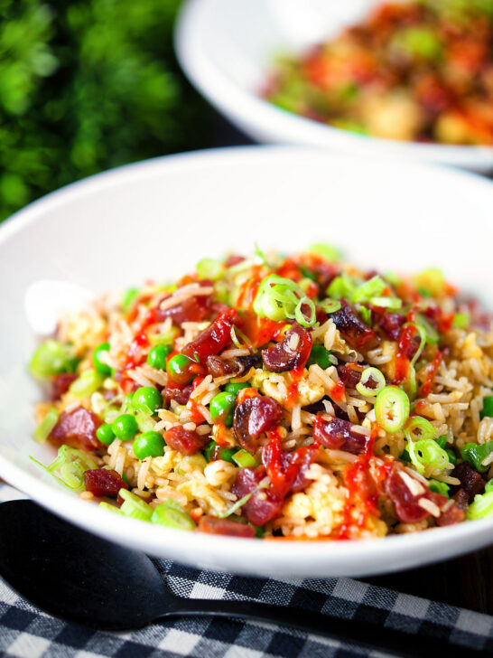 Chinese sausage (lap cheong) and egg fried rice with garden peas and spring onion.