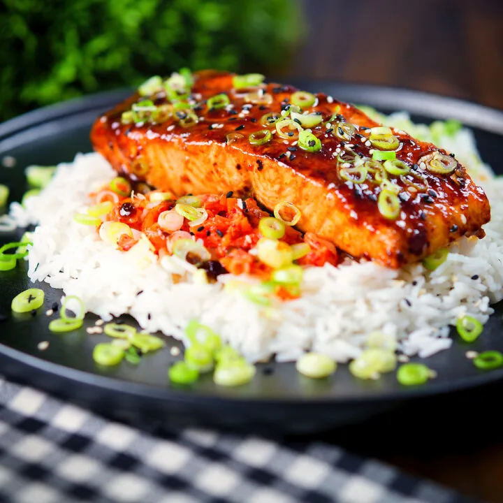 Gochujang and honey glazed salmon fillet served with kimchi and steamed rice.