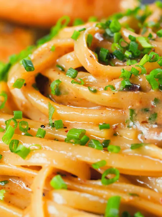 Miso butter pasta with pecorino, black & pink peppercorns and chives.