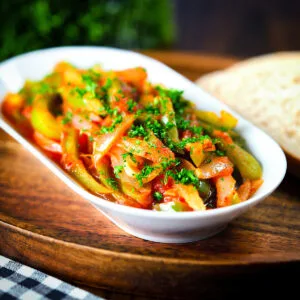 Basque piperade a pepper, onion and tomato stew served with bread.