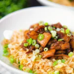 Spicy Shanghai chicken stir fry served with egg fried rice.