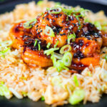 Teriyaki king prawns (shrimp) stir fry served with egg fried rice.