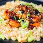 Teriyaki king prawns (shrimp) stir fry served with egg fried rice.