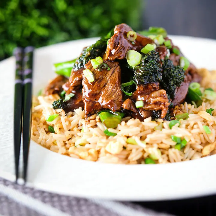 Quick and easy beef (steak) and broccoli stir fry served with egg fried rice.