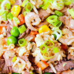 Close-up Chinese takeaway style special fried rice with beef, pork, chicken and prawns.