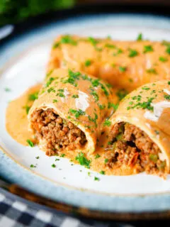 Hortobágyi palacsinta Hungarian meat stuffed pancakes in a sour cream and paprika sauce.