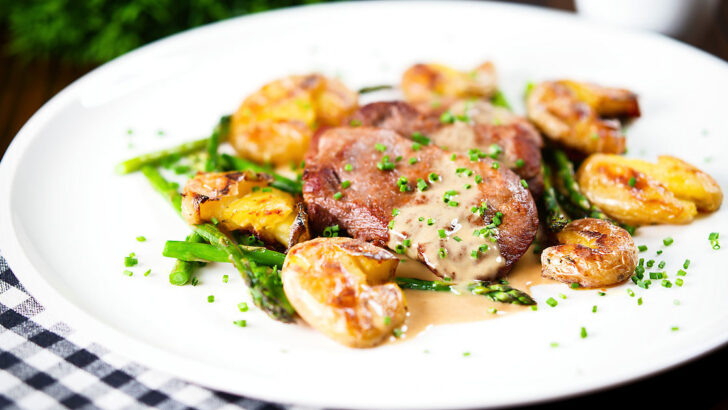 Pan fried pork tenderloin medallions with a cider, mustard and camembert sauce.