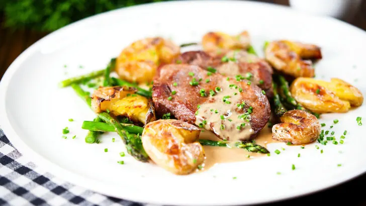Pan fried pork tenderloin medallions with a cider, mustard and camembert sauce.