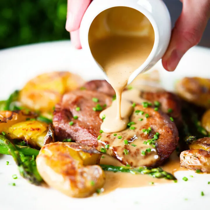 Pan fried pork tenderloin medallions with a cider, mustard and camembert sauce.