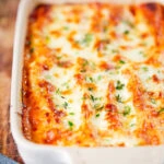 Baked three cheese, pork sausage, leek and ricotta stuffed cannelloni.