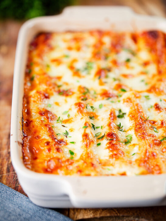 Baked three cheese, pork sausage, leek and ricotta stuffed cannelloni.
