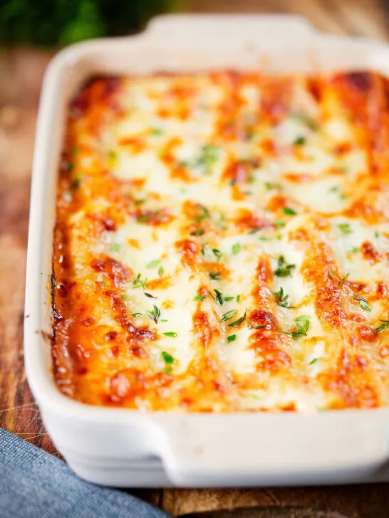 Baked three cheese, pork sausage, leek and ricotta stuffed cannelloni.
