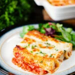 Baked three cheese, pork sausage, leek and ricotta stuffed cannelloni served with a side salad.