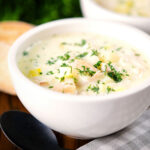 Cullen skink, Scottish smoked haddock and leek chowder or soup served with a bread roll.