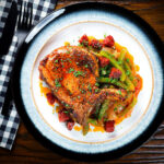 Spanish influenced pork chops with chorizo served with Basque piperade.