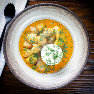 Thai yellow chicken curry with potatoes, shallots and steamed jasmine rice.